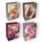 Bolsas de regalo con diseño artístico de tulipanes y detalles dorados en 4 colores distintos, tamaño 18x23cm con asa de cordón.
