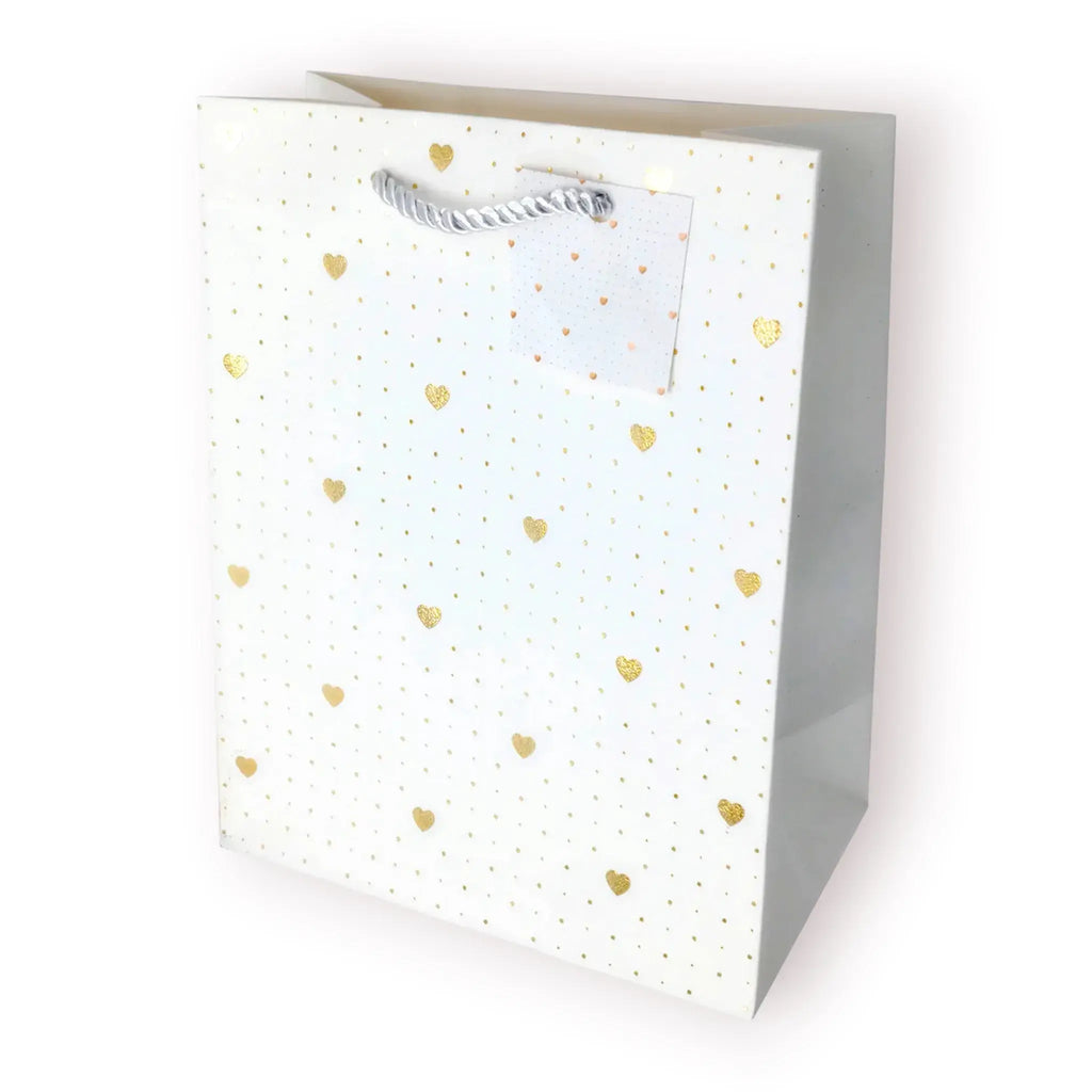 Bolsa de regalo mediana con estampado de corazones dorados metalizados sobre fondos pastel.