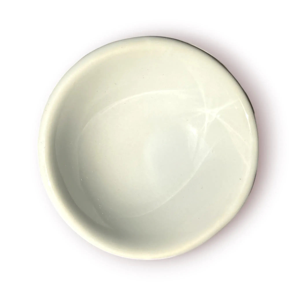 Difusor aromático de cerámica esmaltada modelo clásico para esencias y velas de té, disponible en colores blanco, rosado y azul celeste.