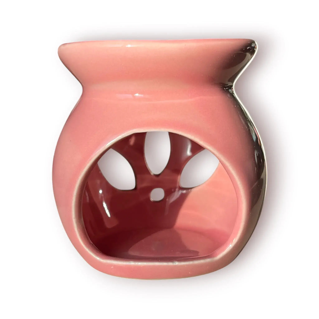Difusor aromático de cerámica esmaltada modelo clásico para esencias y velas de té, disponible en colores blanco, rosado y azul celeste.