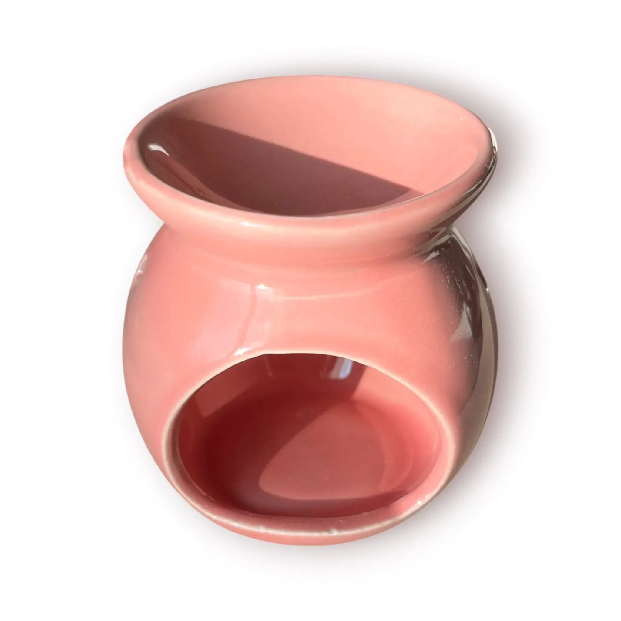 Difusor aromático de cerámica esmaltada modelo clásico para esencias y velas de té, disponible en colores blanco, rosado y azul celeste.