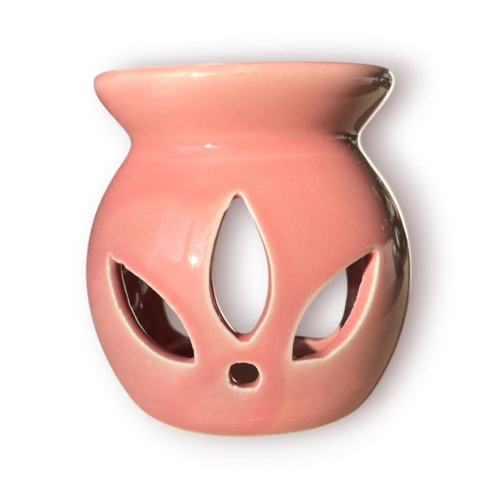 Difusor aromático de cerámica esmaltada modelo clásico para esencias y velas de té, disponible en colores blanco, rosado y azul celeste.