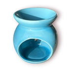 Difusor aromático de cerámica esmaltada modelo clásico para esencias y velas de té, disponible en colores blanco, rosado y azul celeste.