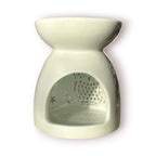 Difusor aromático de cerámica esmaltada color blanco con calados decorativos en forma de búho y estrellas para velas de té.