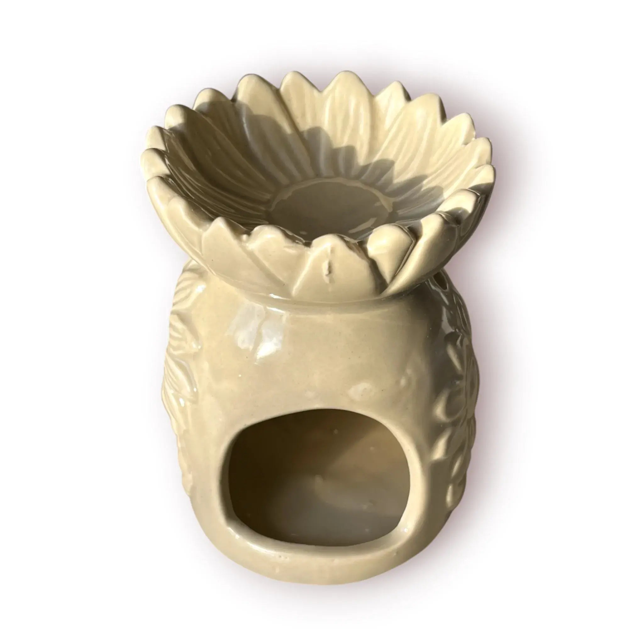 Difusor aromático de cerámica esmaltada con relieve de girasol y cuenco en forma de flor, disponible en colores blanco, café y beige.