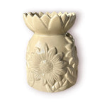 Difusor aromático de cerámica esmaltada con relieve de girasol y cuenco en forma de flor, disponible en colores blanco, café y beige.