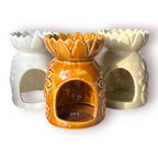 Difusor aromático de cerámica esmaltada con relieve de girasol y cuenco en forma de flor, disponible en colores blanco, café y beige.