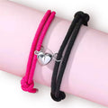 Set pulseras con corazón magnético